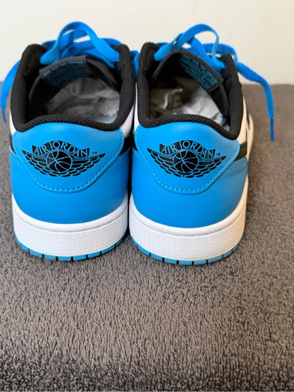 Nike Air Jordan 1 “low” men’s size 10 1/2. Powder blue and Black Dark colorway.